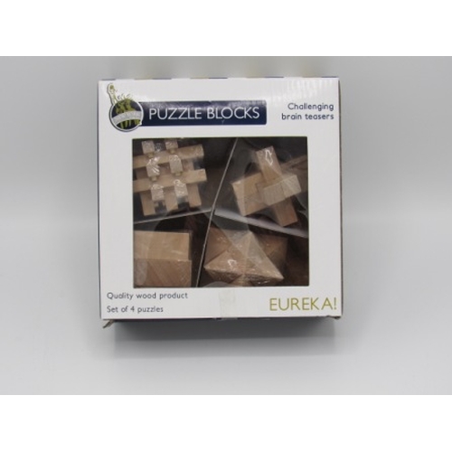 162 - New set of 4 Eureka wooden puzzle blocks