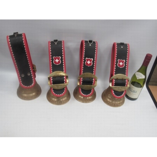 17 - 4 Swiss Solid Cast Metal Cow Bells - used As Skiing Trophies