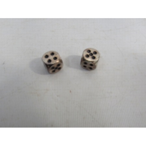 394 - Set of White Metal Dice