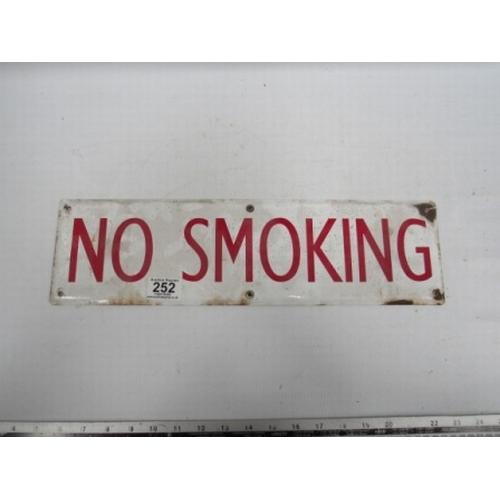 252 - White enamelled metal sign with red lettering