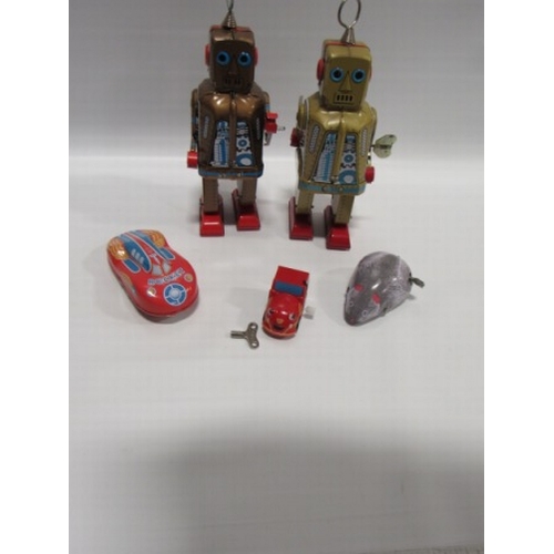 74 - Modern tin plate wind up toys