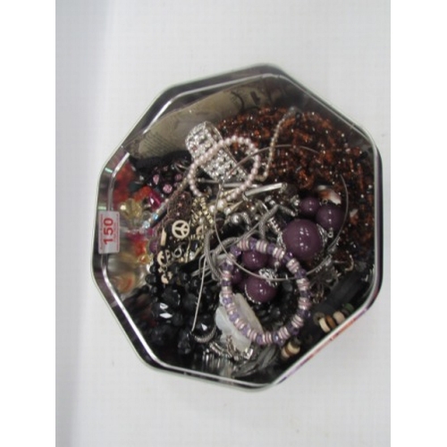 Tin of costume jewellery