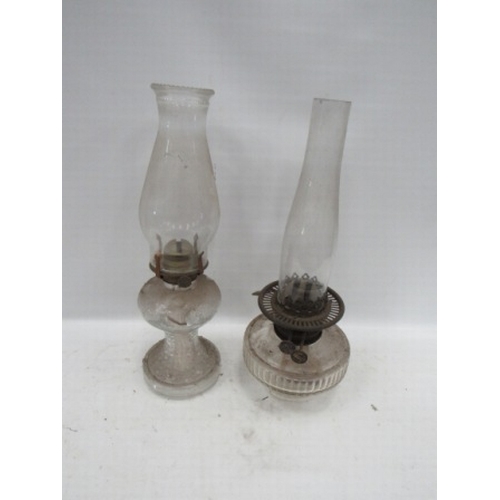 55 - 2 Glass Oil Lamps