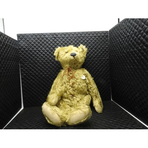 42 - Steiff Teddy Bear with hot water bottle brass-coloured 50cm