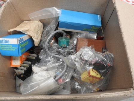 box of bulbs and electronic components