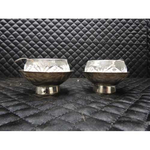 262 - 2 HM silver condiment pots with silver spoons