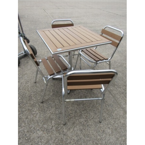 362 - Patio table + 4 chairs