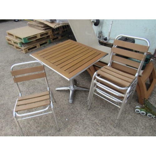 667 - Patio Table + 4 Chairs