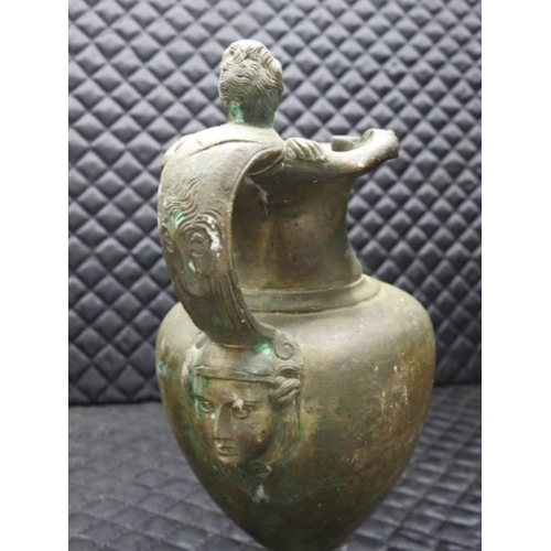 314 - Old Bronze jug, base repaired, approx 3.15kg 20cm