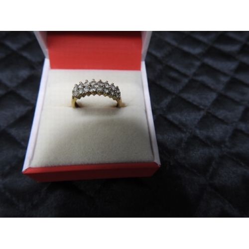 163 - 9ct gold + diamond ring