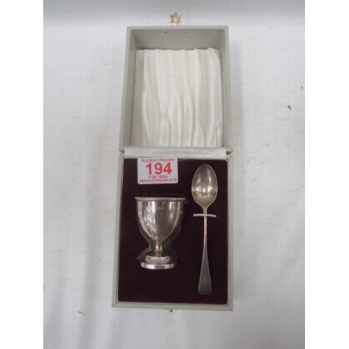 194 - Silver egg cup and spoon set