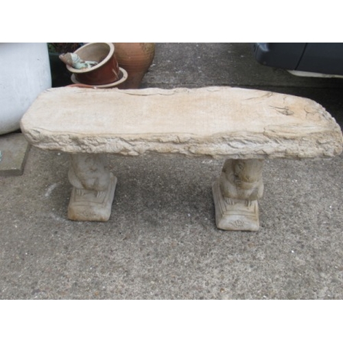 574 - Timber seat - large straight timber look seat on squirrel plinths