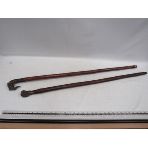 499 - 2 dog handled sticks