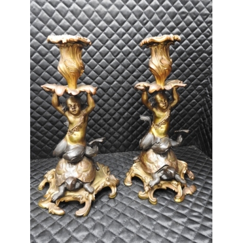 389 - Pair of Bronze turtle & mermaid candlesticks