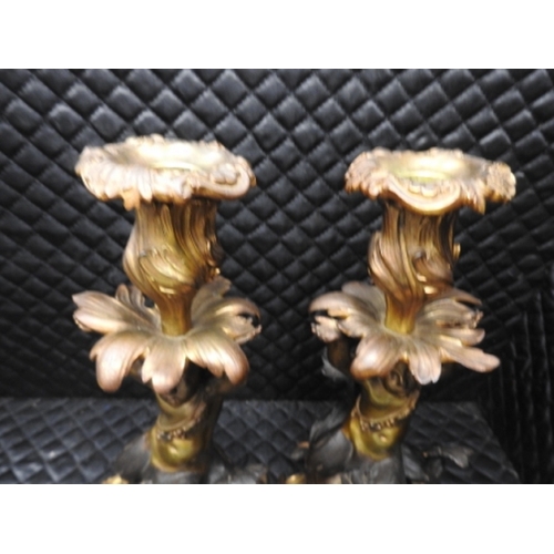 389 - Pair of Bronze turtle & mermaid candlesticks