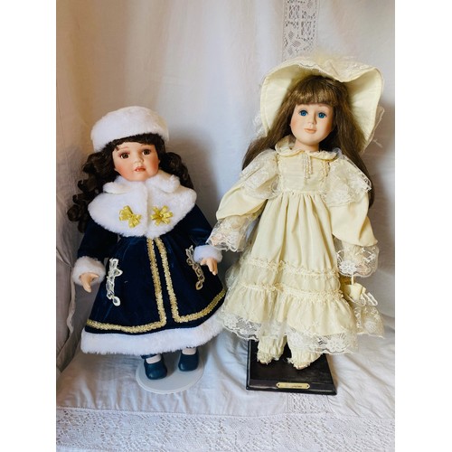 600 - 2 vintage porcelain dolls