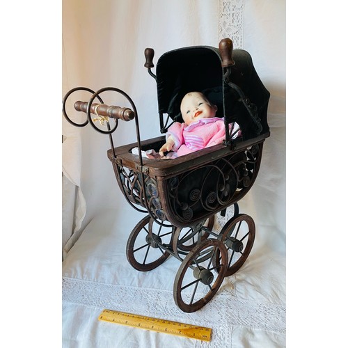 603 - Antique dolls pram and doll