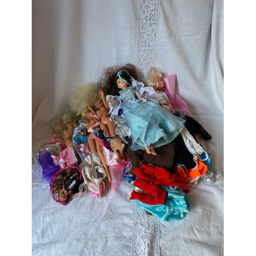 604 - Barbie dolls and handmade clothes