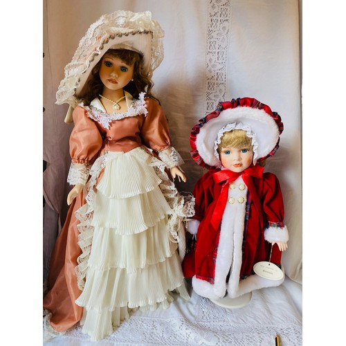146 - 2 vintage porcelain dolls