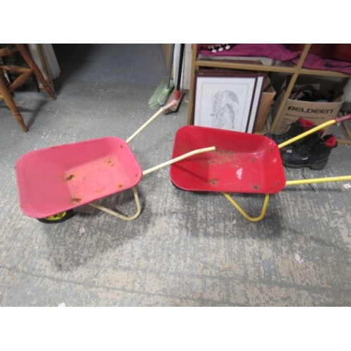 49 - 2 Small childrens wheel Barrows