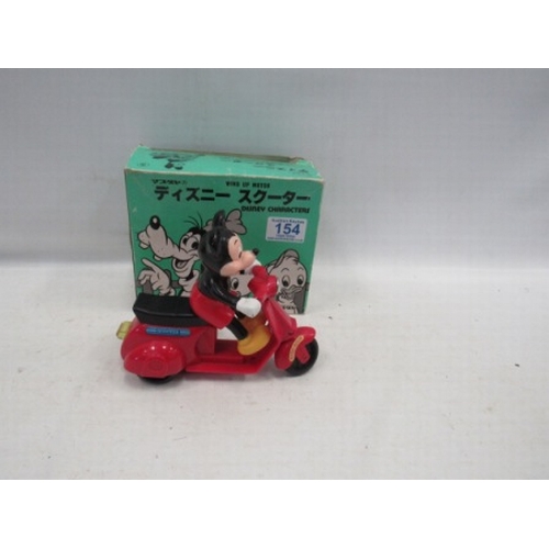 154 - Vintage Micky Mouse on scooter toy