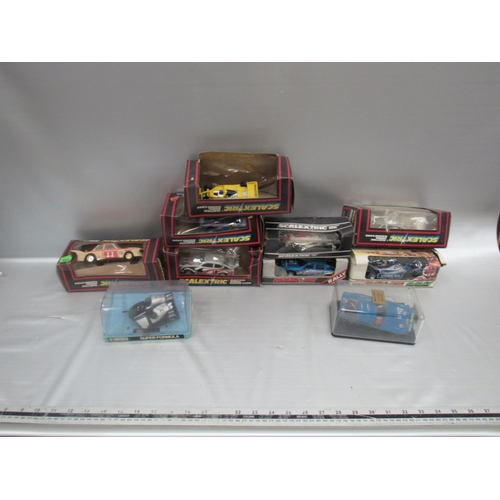 68 - QTY of boxed scalextic cars