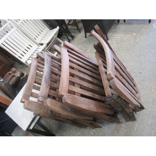 281 - 4 Folding hardwood garden chairs with cushions