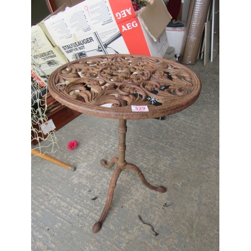 329 - Cast iron garden table