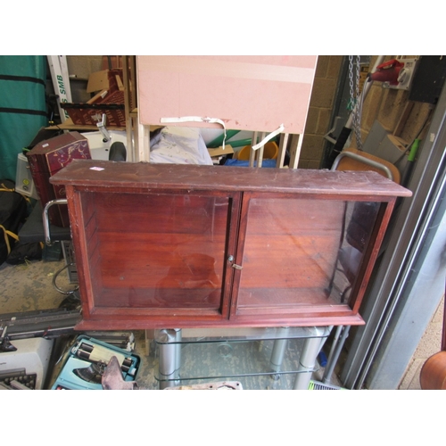 656 - Glass fronted cabinet