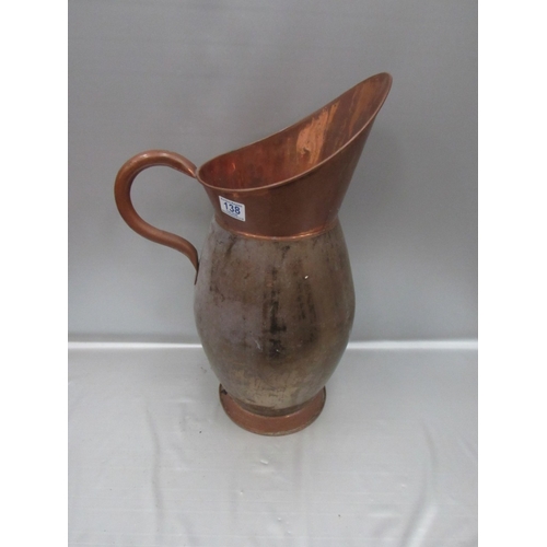 138 - Large copper jug, some dents.