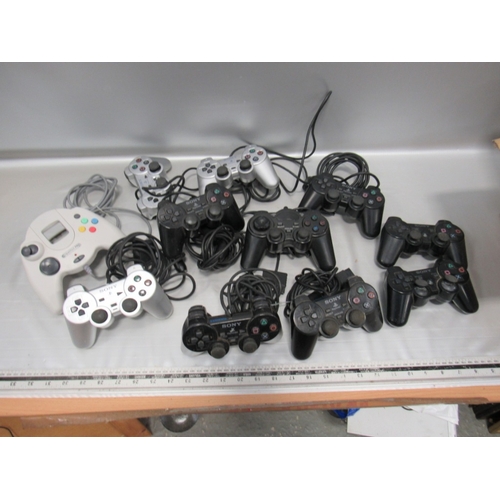 66 - QTY of games controllers