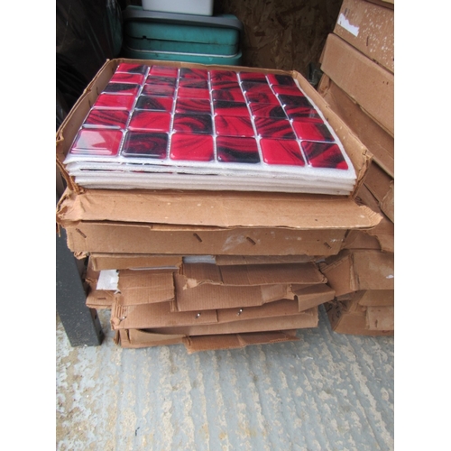 518 - 7 boxes of red glass wall tiles