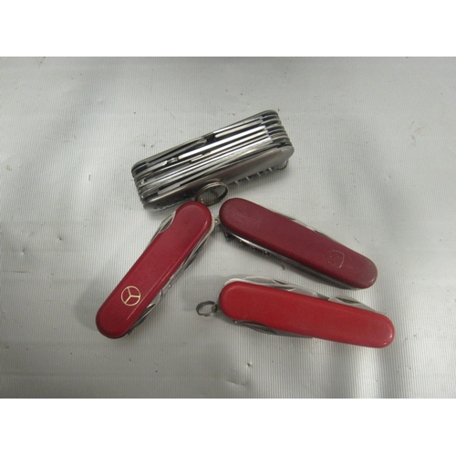 128 - 4 Large multi tool penknives