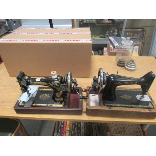 231 - 2 Singer sewing machines