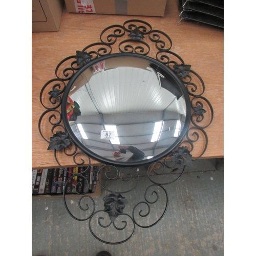 87 - Convex mirror in wrought iron frame