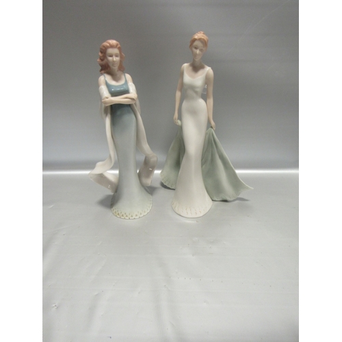 9 - 2 Kim Lawrence figurines