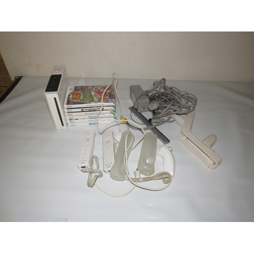 11 - Nintendo Wii + games