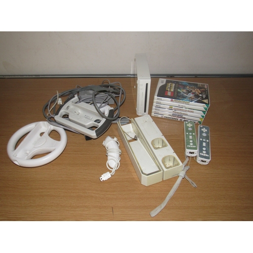 4 - Wii console with games