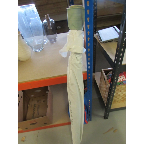244 - Part roll of green material