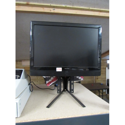 287 - Grundig TV on Stand with remote, Working