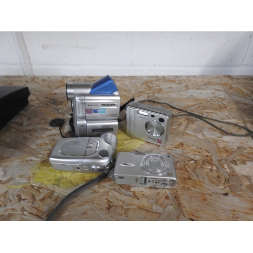 244 - 4 Digital cameras