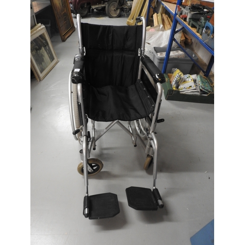 80 - Self-propelling Enigma wheelchiar with footplates