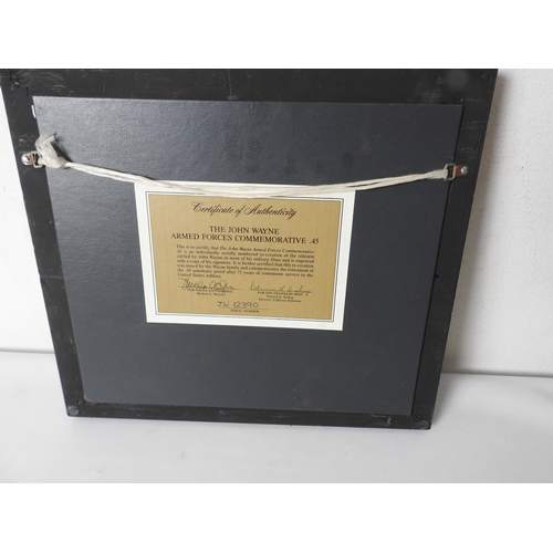 94 - Franklin Mint - John Wayne colt 45 model 1911, with wall board