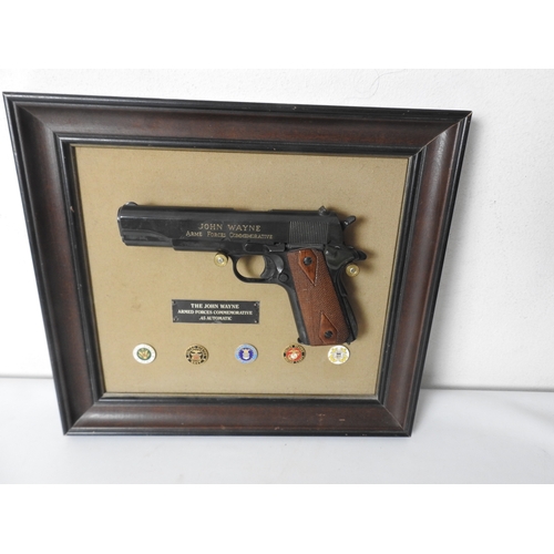 94 - Franklin Mint - John Wayne colt 45 model 1911, with wall board