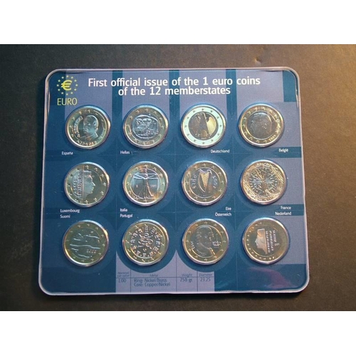 182 - EUROPE.  Set of twelve 1 Euro coins sealed in plastic card, First Official Issue of the 1 Euro Coins... 