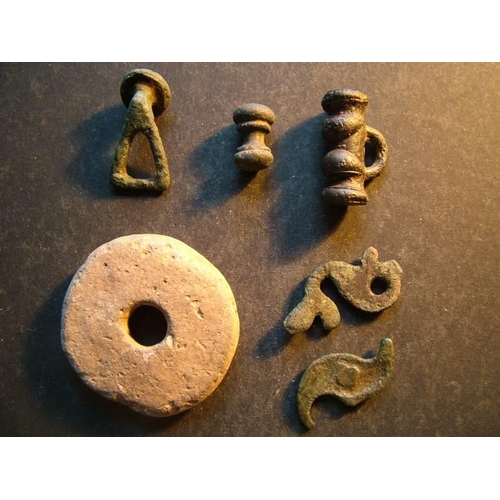 653 - Late Iron Age / Roman.  Small mixed lot, including clay spindle whorl. Approximately 43mm in diamete... 