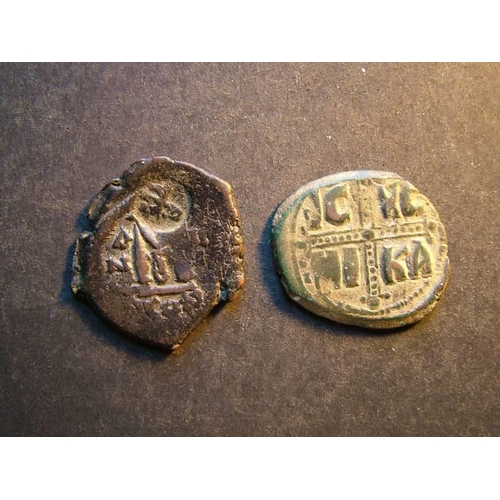 132 - BYZANTINE EMPIRE.  Heraclius (AD610-641), Ae Follis, Constantinople mint, S-804, cross above M on re... 