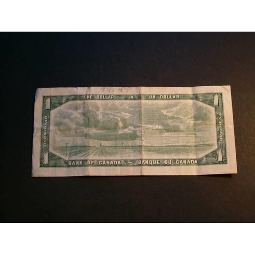30 - CANADA.  $1, 1954, sign. Beattie & Rasminsky, P-75b, prefix Z/Z, F, creases.