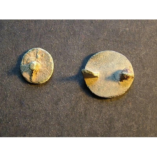 488 - Romano-British.  Small circular bronze stud, approximately 14.5mm, decorated with 6 small annulets i... 