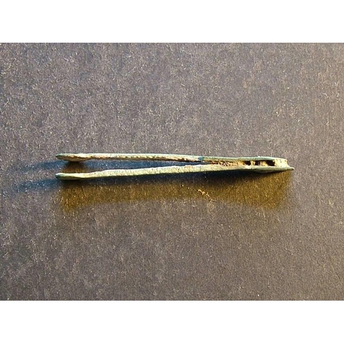 492 - Romano-British.  Bronze tweezers, approximately 43mm in length, made in two pieces riveted together,... 